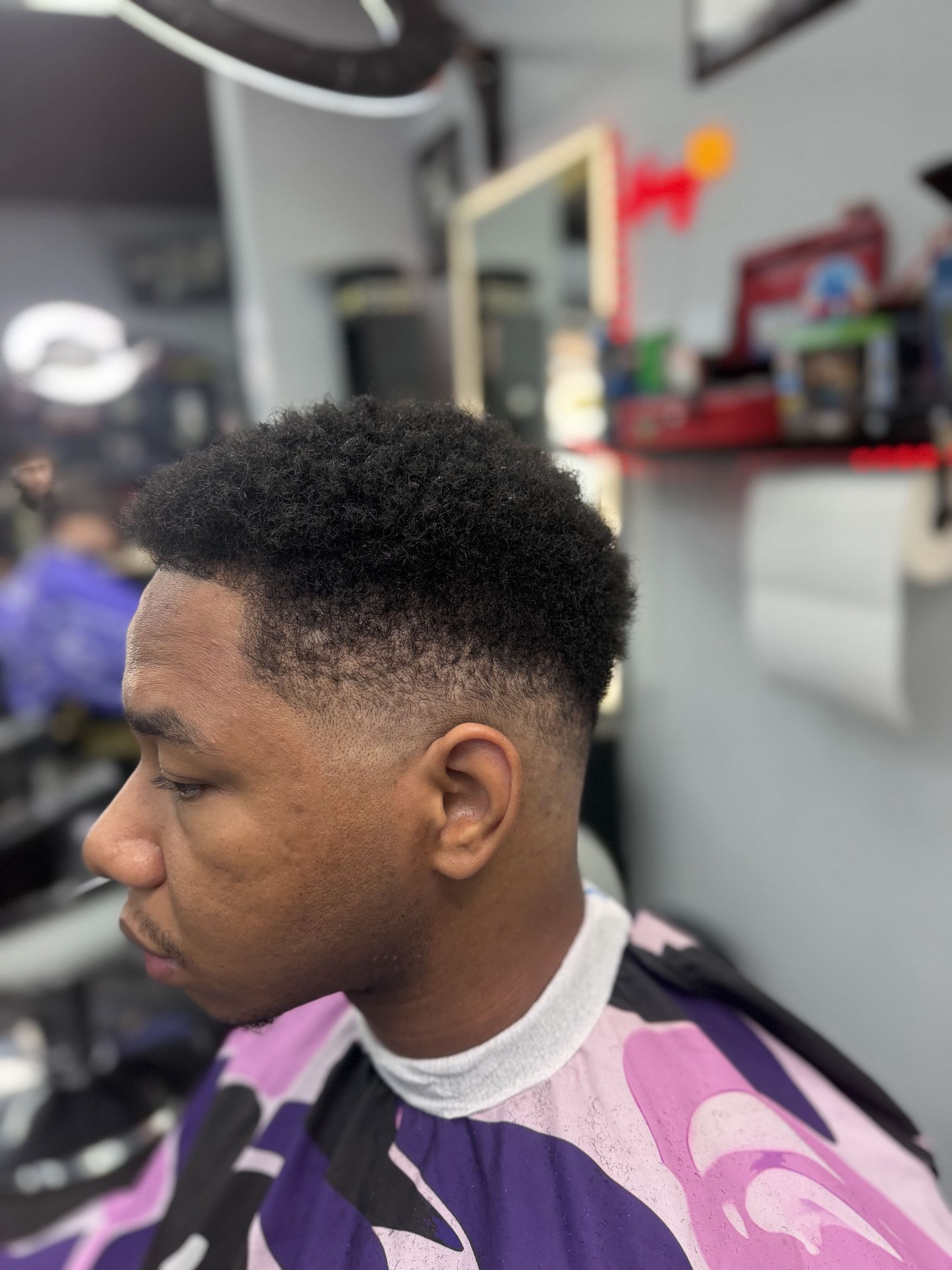Detailed taper haircut at Faded Cutz Queens Jamaica